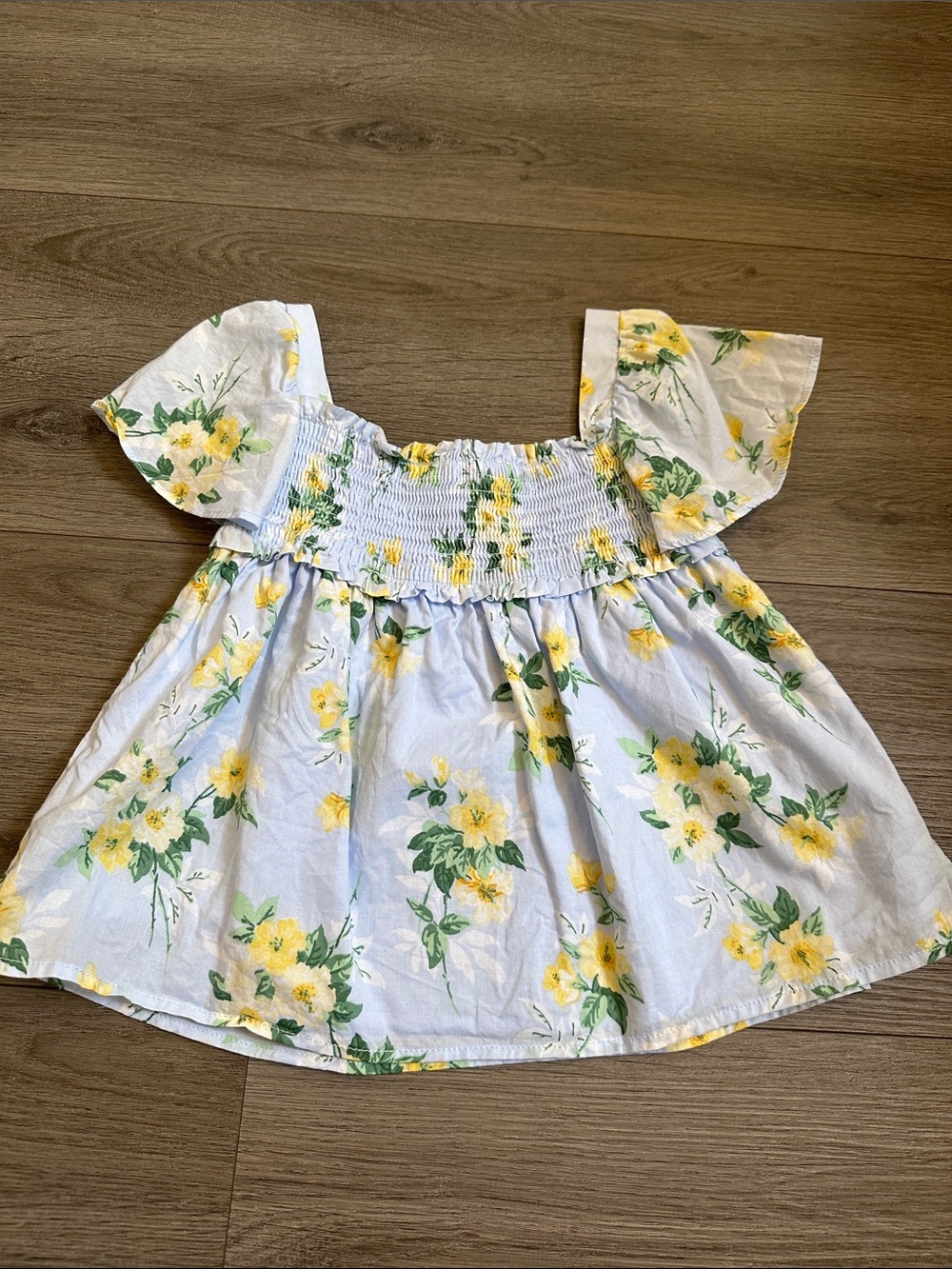 Janie and Jack Light Blue Smocked Top with Yellow Floral Accent